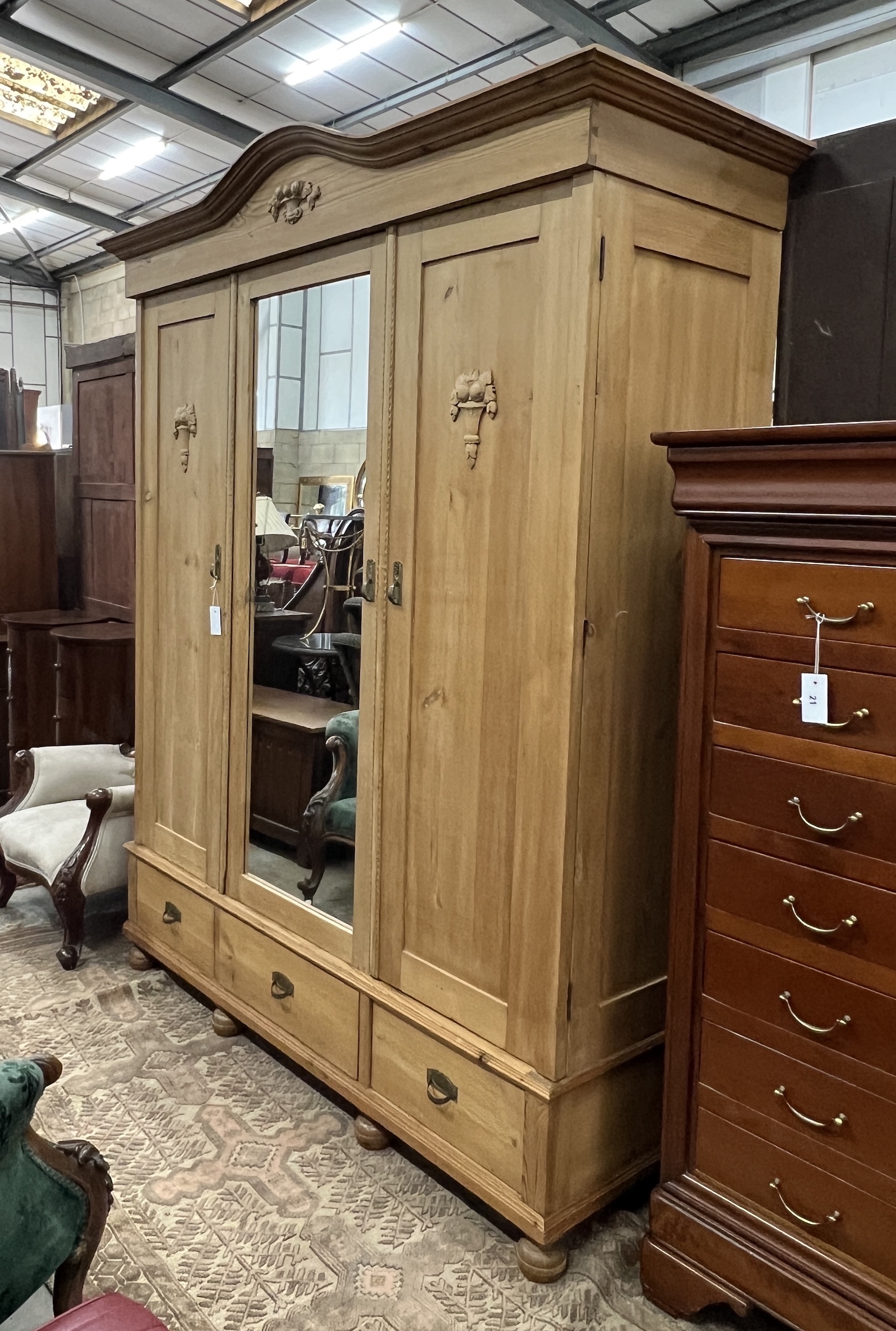 A late 19th century East European 'knock flat' pine three door mirrored wardrobe, width 172cm, depth 64cm, height 213cm